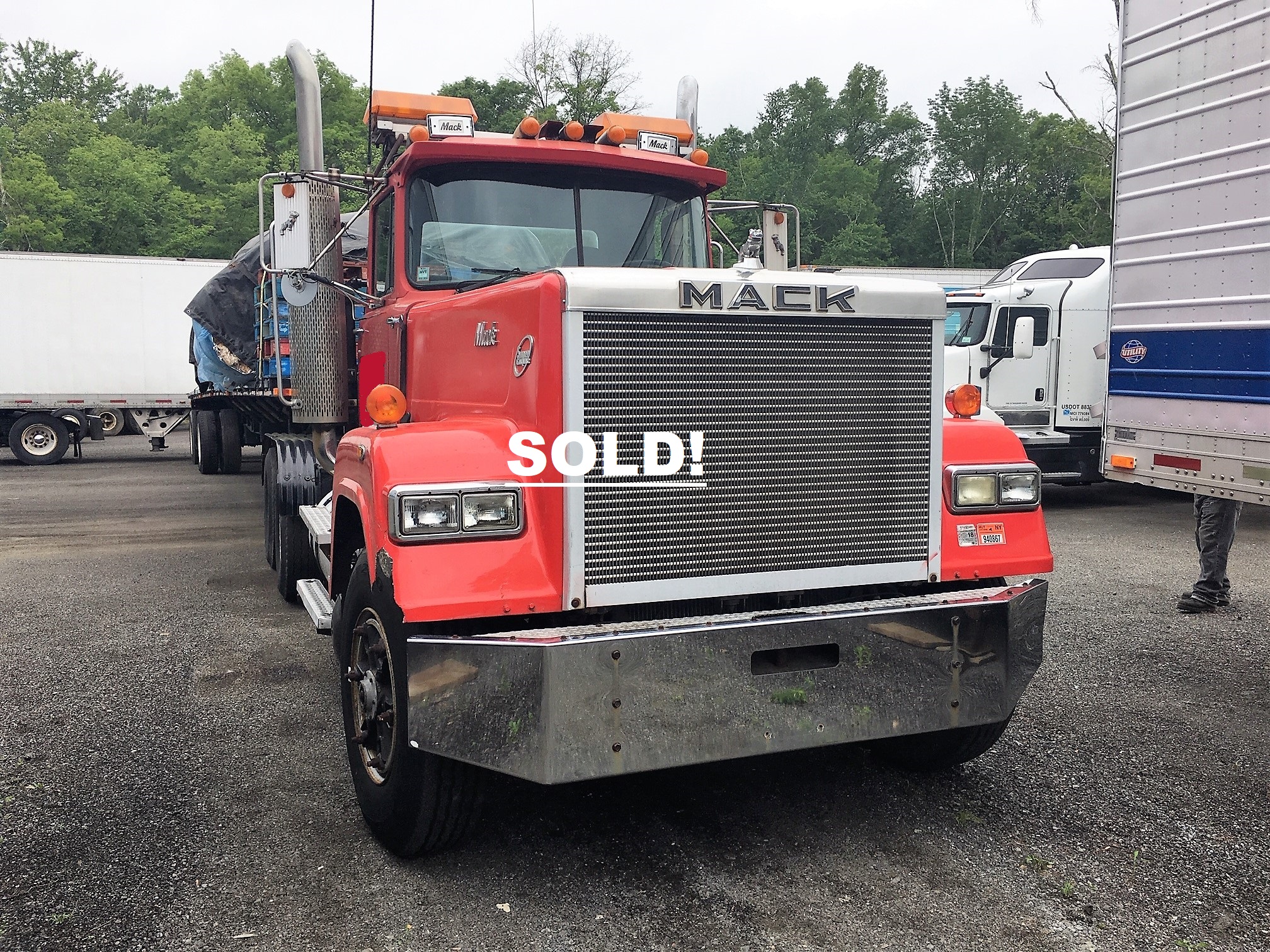 Mack Super Liner Semi Truck. 1990 model heavy hauler super liner semi tractor truck. The engine is a 425 Caterpillar with 200'000 original miles. The transmission is an 8 speed low low. This truck has a 55 ton fifth wheel and a 3 way PTO with a wet line. This Mack super liner semi truck also has 315 tires all around a Canadian spread and a ride that's like new.