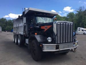 Autocar Tri-Axle Dump Truck. 1989 with 630'000 miles on a 425 Caterpillar engine and an 8 LL transmission. 20 yard dump box. New drive tires, clutch, piston, rear. Runs great. No Leeks!