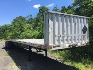 Aluminum flatbed semi trailer. 2004 Manac in great condition. Trailer for sale as seen with added bulkhead, new tool box and two dunnage racks. Has newer air tank and tires that are at about 70% - 80% tread. Great trailer ready to work. Unladen weight 9050 lbs.