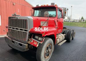 Ford LTL 9000 Truck. 1987 LTL semi tractor truck. Double frame heavy hauler with a rebuilt 425-B Caterpillar engine. Approximately 170'000 frame miles and 79'000 on rebuilt engine. The transmission is an 8 speed Eaton Fuller Roadranger with Lo and Lo, Lo. There are 46'000 lb. rears, two stage engine break, power steering, wet line and PTO. Rough hood condition but real good runner.