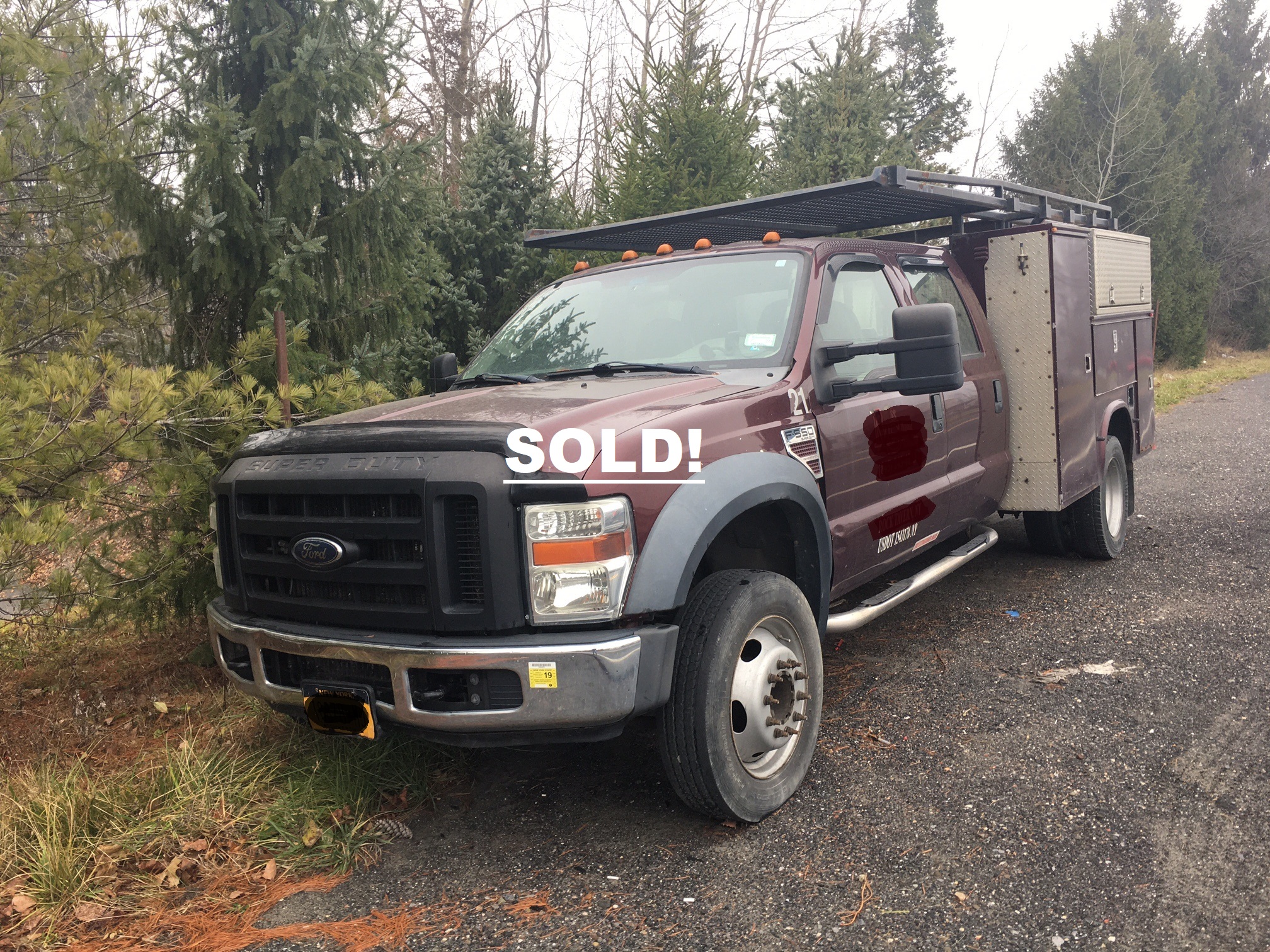 Ford F550 service truck. A 2009 XL Super Duty service truck with a 6.4 V8 power stroke diesel engine. Automatic transmission and an 11 foot tool rack utility box. The truck has approximately 170K miles. Engine runs but loses power.