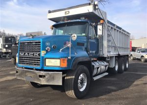 Mack Tri-Axle Dump Truck. 1998 CL-713 model truck with an E7-427 V Mac Engine driven 440'000 miles. 8 speed low/low Eaton Fuller transmission. Straight tri-axle "non steerable" 46'000 lb. newer rears, yolks and U joints. New radiator. Air ride suspension. Comfortable driving and riding dump truck. J&J 24 yard aluminum side steel floor dump box measuring 19 1/2 feet long by 5 feet 8 inches high. Great truck for hauling coal, mulch, blacktop, dirt, rock or gravel material.