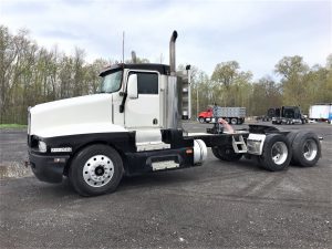 Kenworth T600 Semi Truck. 1994 conventional day cab. Caterpillar 3406C 425 horsepower diesel engine with 968563 frame miles. 168'563 miles on in house in frame rebuild. Eaton Fuller Roadranger super 10 transmission. 370/44K rears, 260 inch wheelbase. (8) airbag-air ride suspension with 12k fronts. Aluminum bud wheels and 11/24 tires. East aluminum bulkhead with backup/work area lighting. Three stage engine brake, cruise control, mirror heat, AC equipped-needs a charge. Air ride drivers seat.