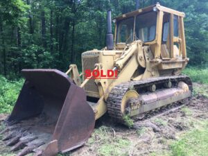 Caterpillar 977L Track Loader. Model year 1977 with a 6 cylinder 190 horsepower 3306 engine. Newer rollers, idlers and track tension pistons repacked. Enclosed ROPS. Approximate 4 - 4.5 yard bucket. Weight 47'641 lbs.