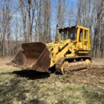 Caterpillar 977L Track Loader. Model year 1977 with a 6 cylinder 190 horsepower 3306 engine. Newer rollers, idlers and track tension pistons repacked. Enclosed ROPS. Approximate 4 - 4.5 yard bucket. Weight 47'641 lbs.