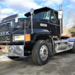 Mack CL713 Semi Tractor. 1999 Mack Elite day cab conventional with a 500 horsepower V8 diesel engine and 463015 miles. Maxitorque extended range 12 speed splitter transmission. Rear axle power divider. 12k front suspension. Hendrickson air ride rear suspension with 44k lbs. rears and 4.42 ratio.  187" inch wheelbase. Double frame. PTO and Wetline set up. Engine break. Air ride drivers seat. Heat and A/C.