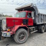 Autocar triable dump truck for sale.