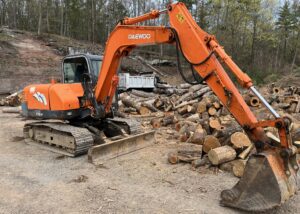 Daewoo Solar 75v Excavator. 2005 model mini also known as a "midi" excavator. Powered by a 4 cylinder Yanmar diesel engine with a low 4424.8 hours. The machines operating weight is 17,643 lbs. It has a dig depth of 13.2' feet. It has a load height of 14.1' feet. The excavator has a finishing blade along with an approximate 3/4 yard bucket. The excavator is fitted with a duel hydraulic line system for additional attachments. Heat and AC are in working order. Transport width is 7.3' outside track. 20' with boom/stick closed and down.