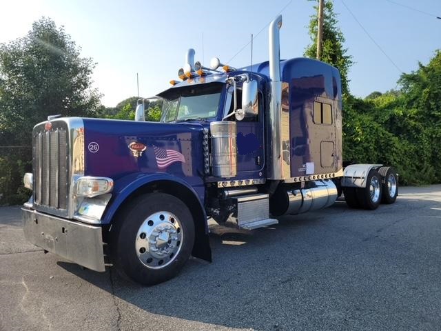 Peterbuilt 389 Semi Tractor. 2014 model semi tractor truck. Cummins ISX15 389 engine with 650k miles. Eaton Fuller 18 speed transmission. 12k front axle, 40K rear axles, 3.36 rear axle ratio and a 280 inch wheelbase. 70 inch ultracab sleeper with prestige interior package. Fully serviced and detailed inside and out. Turn key and ready to go.