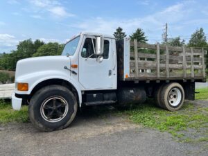 1990 International flatbed work truck for sale.