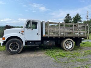 1990 International flatbed work truck for sale.