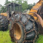 John Deere 640D Log Skidder: 1987 JD 640d cable log skidder with a John Deere 6-414t engine re-sleeved in the early 2000s. It has 28,632 total hours on the machine. The transmission is a power shift with 8 forward and 4 reverse gears. It has articulated frame steering. The foot brake is a week and may need attention. The hand brake works fine. The John Deere 640d logging skidder is chained up! It has an operating weight of 20,180 lbs, a wheelbase of 113 inches, and a 19.2-inch clearance.