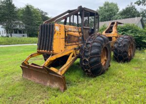 John Deere 640D Log Skidder: 1987 JD 640d cable log skidder with a John Deere 6-414t engine re-sleeved in the early 2000s. It has 28,632 total hours on the machine. The transmission is a power shift with 8 forward and 4 reverse gears. It has articulated frame steering. The foot brake is a week and may need attention. The hand brake works fine. The John Deere 640d logging skidder is chained up! It has an operating weight of 20,180 lbs, a wheelbase of 113 inches, and a 19.2-inch clearance.