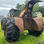 John Deere 640D Log Skidder: 1987 JD 640d cable log skidder with a John Deere 6-414t engine re-sleeved in the early 2000s. It has 28,632 total hours on the machine. The transmission is a power shift with 8 forward and 4 reverse gears. It has articulated frame steering. The foot brake is a week and may need attention. The hand brake works fine. The John Deere 640d logging skidder is chained up! It has an operating weight of 20,180 lbs, a wheelbase of 113 inches, and a 19.2-inch clearance.