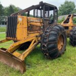 John Deere 640D Log Skidder: 1987 JD 640d cable log skidder with a John Deere 6-414t engine re-sleeved in the early 2000s. It has 28,632 total hours on the machine. The transmission is a power shift with 8 forward and 4 reverse gears. It has articulated frame steering. The foot brake is a week and may need attention. The hand brake works fine. The John Deere 640d logging skidder is chained up! It has an operating weight of 20,180 lbs, a wheelbase of 113 inches, and a 19.2-inch clearance.