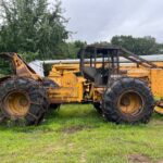 John Deere 640D Log Skidder: 1987 JD 640d cable log skidder with a John Deere 6-414t engine re-sleeved in the early 2000s. It has 28,632 total hours on the machine. The transmission is a power shift with 8 forward and 4 reverse gears. It has articulated frame steering. The foot brake is a week and may need attention. The hand brake works fine. The John Deere 640d logging skidder is chained up! It has an operating weight of 20,180 lbs, a wheelbase of 113 inches, and a 19.2-inch clearance.