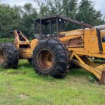 John Deere 640D Log Skidder: 1987 JD 640d cable log skidder with a John Deere 6-414t engine re-sleeved in the early 2000s. It has 28,632 total hours on the machine. The transmission is a power shift with 8 forward and 4 reverse gears. It has articulated frame steering. The foot brake is a week and may need attention. The hand brake works fine. The John Deere 640d logging skidder is chained up! It has an operating weight of 20,180 lbs, a wheelbase of 113 inches, and a 19.2-inch clearance.