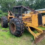 John Deere 640D Log Skidder: 1987 JD 640d cable log skidder with a John Deere 6-414t engine re-sleeved in the early 2000s. It has 28,632 total hours on the machine. The transmission is a power shift with 8 forward and 4 reverse gears. It has articulated frame steering. The foot brake is a week and may need attention. The hand brake works fine. The John Deere 640d logging skidder is chained up! It has an operating weight of 20,180 lbs, a wheelbase of 113 inches, and a 19.2-inch clearance.