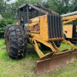 John Deere 640D Log Skidder: 1987 JD 640d cable log skidder with a John Deere 6-414t engine re-sleeved in the early 2000s. It has 28,632 total hours on the machine. The transmission is a power shift with 8 forward and 4 reverse gears. It has articulated frame steering. The foot brake is a week and may need attention. The hand brake works fine. The John Deere 640d logging skidder is chained up! It has an operating weight of 20,180 lbs, a wheelbase of 113 inches, and a 19.2-inch clearance.