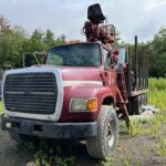 For Sale: 97 Ford L9000 Tri-Axle Log Truck. with a Serco 8000 Loader and Prentice grapple.