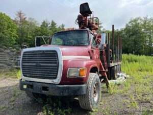 For Sale: 97 Ford L9000 Tri-Axle Log Truck. with a Serco 8000 Loader and Prentice grapple.