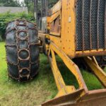 John Deere 640D Log Skidder: 1987 JD 640d cable log skidder with a John Deere 6-414t engine re-sleeved in the early 2000s. It has 28,632 total hours on the machine. The transmission is a power shift with 8 forward and 4 reverse gears. It has articulated frame steering. The foot brake is a week and may need attention. The hand brake works fine. The John Deere 640d logging skidder is chained up! It has an operating weight of 20,180 lbs, a wheelbase of 113 inches, and a 19.2-inch clearance.