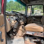 1997 Ford L9000 Tri-Axle Log Truck for sale.