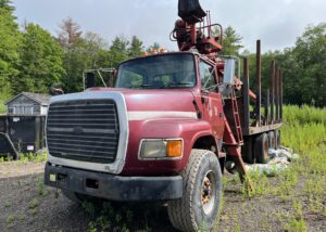 For Sale: 97 Ford L9000 Tri-Axle Log Truck. with a Serco 8000 Loader and Prentice grapple.