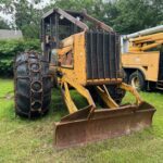 John Deere 640D Log Skidder: 1987 JD 640d cable log skidder with a John Deere 6-414t engine re-sleeved in the early 2000s. It has 28,632 total hours on the machine. The transmission is a power shift with 8 forward and 4 reverse gears. It has articulated frame steering. The foot brake is a week and may need attention. The hand brake works fine. The John Deere 640d logging skidder is chained up! It has an operating weight of 20,180 lbs, a wheelbase of 113 inches, and a 19.2-inch clearance.