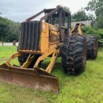 John Deere 640D Log Skidder: 1987 JD 640d cable log skidder with a John Deere 6-414t engine re-sleeved in the early 2000s. It has 28,632 total hours on the machine. The transmission is a power shift with 8 forward and 4 reverse gears. It has articulated frame steering. The foot brake is a week and may need attention. The hand brake works fine. The John Deere 640d logging skidder is chained up! It has an operating weight of 20,180 lbs, a wheelbase of 113 inches, and a 19.2-inch clearance.