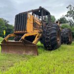 John Deere 640D Log Skidder: 1987 JD 640d cable log skidder with a John Deere 6-414t engine re-sleeved in the early 2000s. It has 28,632 total hours on the machine. The transmission is a power shift with 8 forward and 4 reverse gears. It has articulated frame steering. The foot brake is a week and may need attention. The hand brake works fine. The John Deere 640d logging skidder is chained up! It has an operating weight of 20,180 lbs, a wheelbase of 113 inches, and a 19.2-inch clearance.