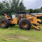 John Deere 640D Log Skidder: 1987 JD 640d cable log skidder with a John Deere 6-414t engine re-sleeved in the early 2000s. It has 28,632 total hours on the machine. The transmission is a power shift with 8 forward and 4 reverse gears. It has articulated frame steering. The foot brake is a week and may need attention. The hand brake works fine. The John Deere 640d logging skidder is chained up! It has an operating weight of 20,180 lbs, a wheelbase of 113 inches, and a 19.2-inch clearance.