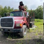 For Sale: 97 Ford L9000 Tri-Axle Log Truck. with a Serco 8000 Loader and Prentice grapple.