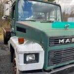 Used 1990 Mack Renault 6 cylinder flatbed work delivery truck for sale.