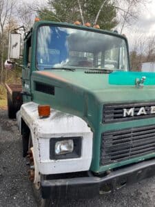 Used 1990 Mack Renault 6 cylinder flatbed work delivery truck for sale.