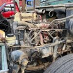 Used 1990 Mack Renault 6 cylinder flatbed work delivery truck for sale.